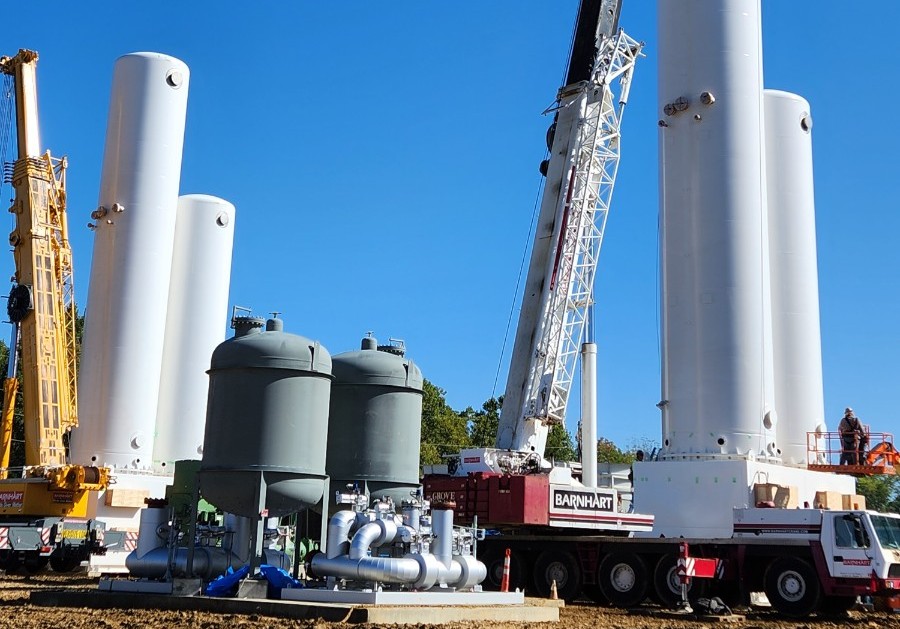 Cooperative Tandem Dual Crane Lift